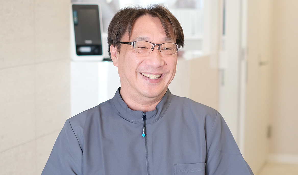 津田 賢治 院長