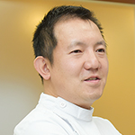 二村 吉継 院長