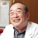 築根 吉彦 院長