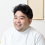 朝廣 賢哉 院長