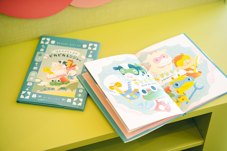 カネコデンタルオフィス 松山市 デンタルIQ向上のため、絵本の制作などさまざまな活動を行う